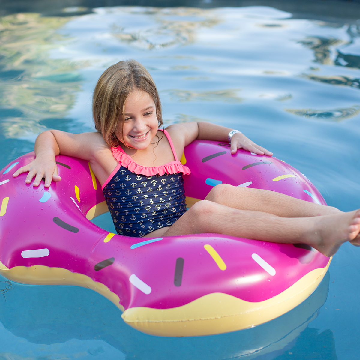 61481-strawberry-donut-pool-float-lifestyle-shot-2 - Wham-O