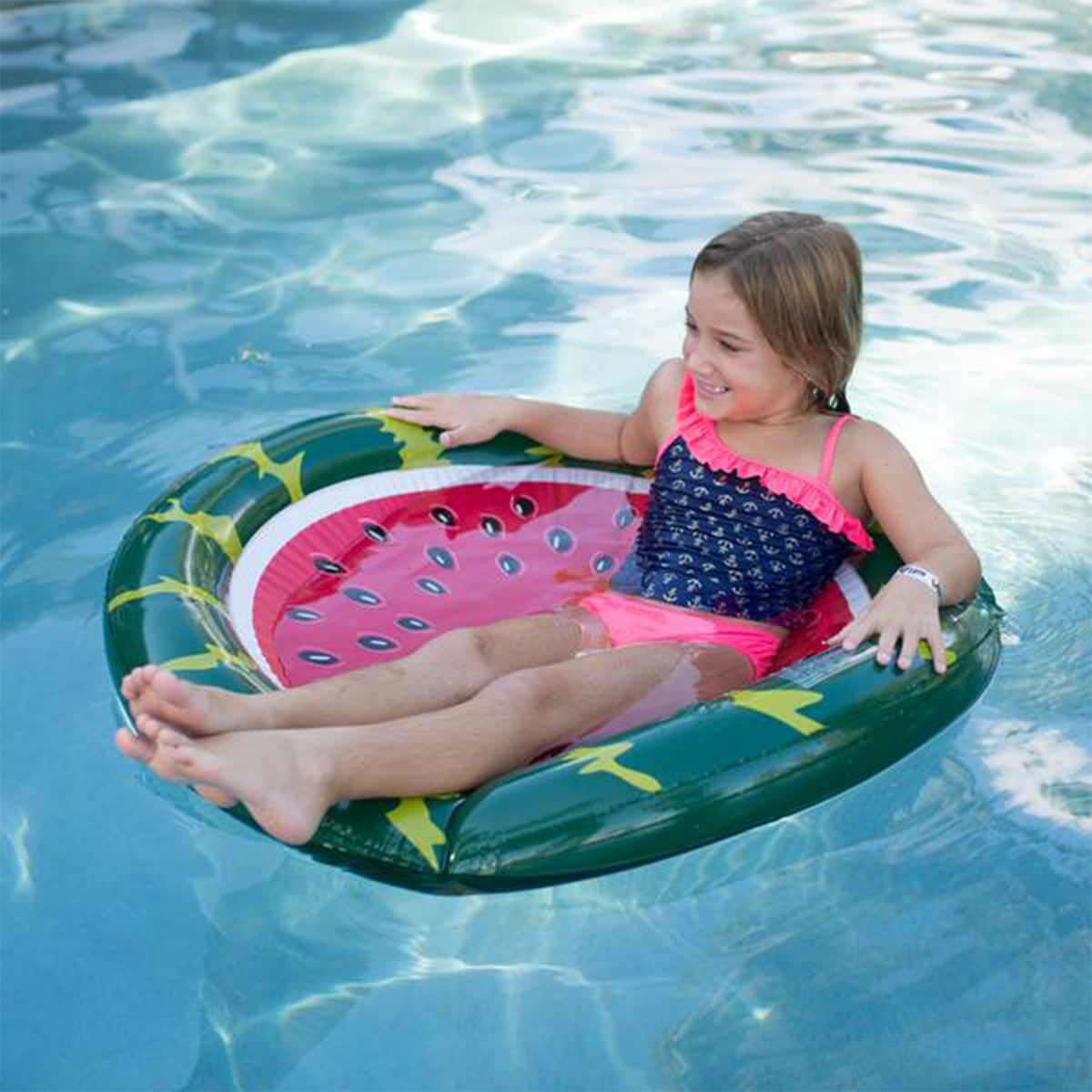 61527-watermelon-pool-float-lifestyle-shot-1_4aa8a62d-49a1-4e03-bc51-c4c754f1e9da - Wham-O